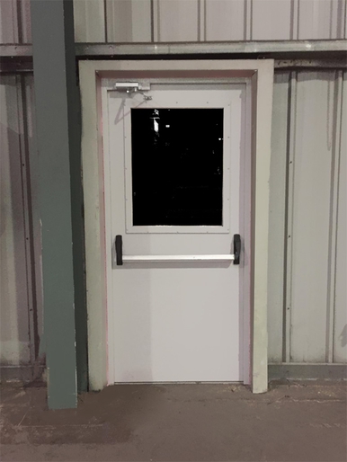 Остекленная дверь Антипаника, фото изнутри (г. Мытищи, склад)